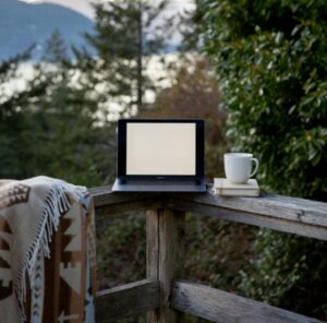 A private peaceful off grid location with laptop and coffee.